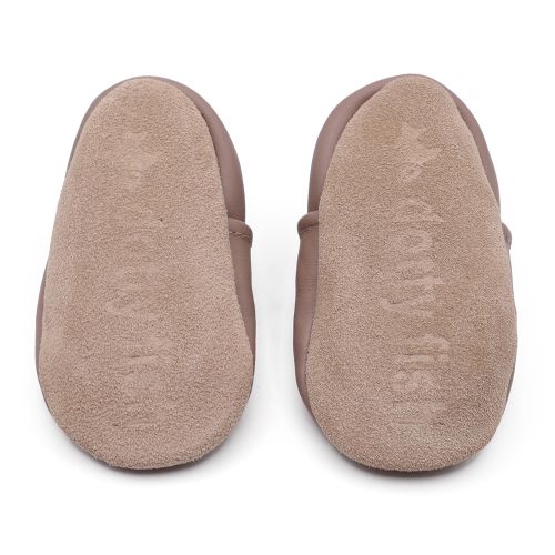 Soft suede non-slip sole of Dotty Fish infant shoes imprinted with Dotty Fish name and logo.