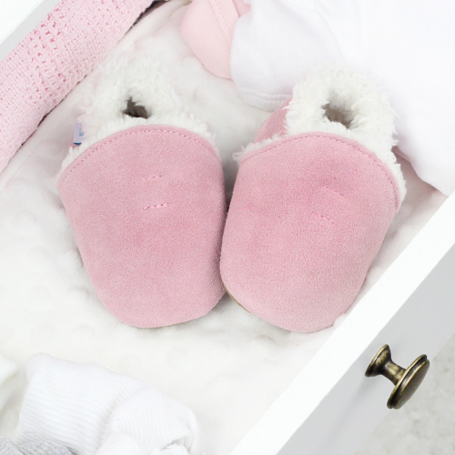 Pale pink suede slippers with fleece lining, in drawer.