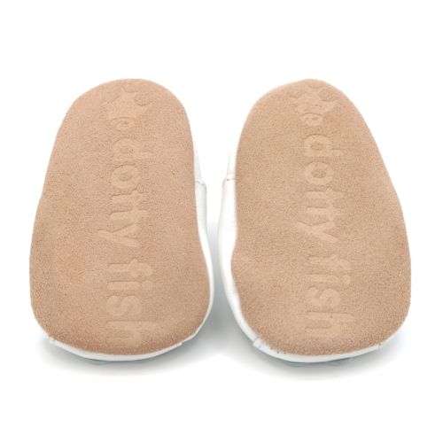 Non-slip soft suede soles of Dotty Fish pre-walker shoes imprinted with Dotty Fish name and logo.
