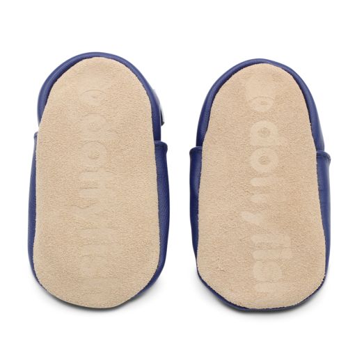 Non-slip soft suede soles of Dotty Fish baby boots imprinted with Dotty Fish name and logo.