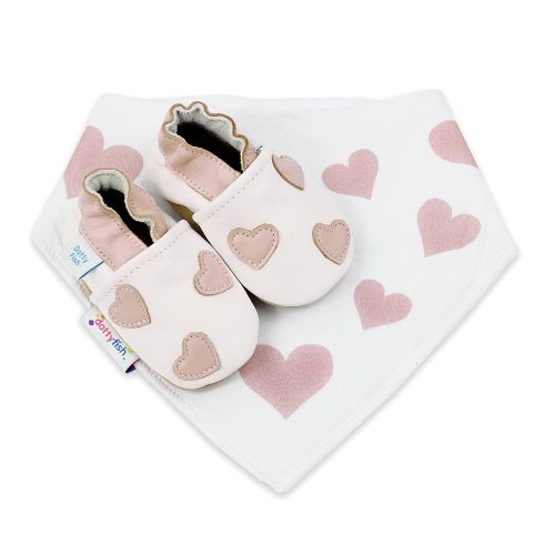 White Dotty Fish soft sole shoes with pink ankle trim and pink hearts, with a matching white bib with pink hearts pattern.