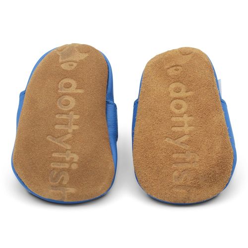 Soft suede non-slip sole of Dotty Fish infant shoes imprinted with Dotty Fish name and logo.