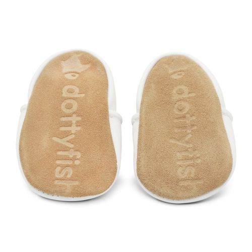Soft suede non-slip sole of Dotty Fish infant shoes imprinted with Dotty Fish name and logo.