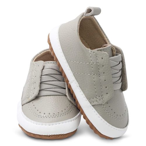 Unisex first walker slip-on shoes in pale grey leather with rubber sole.