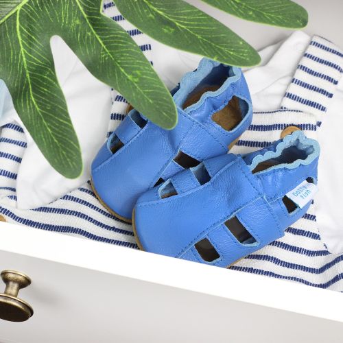 Bright blue leather baby sandals.
