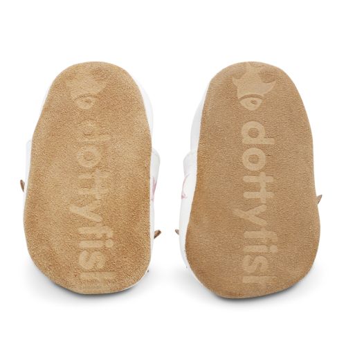 Soft suede non-slip sole of Dotty Fish infant shoes imprinted with Dotty Fish name and logo.