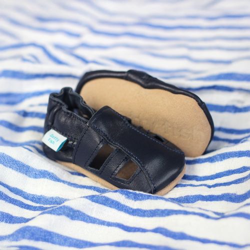Dotty Fish soft leather sandals in navy blue.