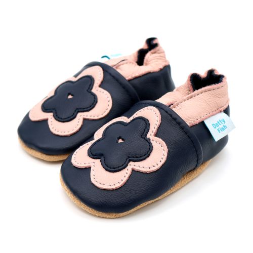 Navy blue leather Dotty Fish soft sole pre-walker shoes with pink ankle trim and pink and navy flower.