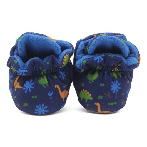 Back of blue baby booties, with dinosaur pattern.