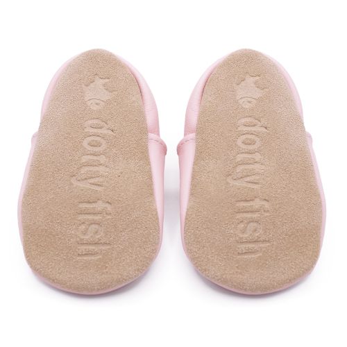 Non-slip soft suede soles of Dotty Fish pre-walker shoes imprinted with Dotty Fish name and logo.