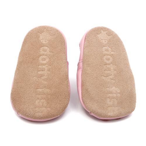 Soft suede non-slip sole of Dotty Fish infant shoes imprinted with Dotty Fish name and logo.