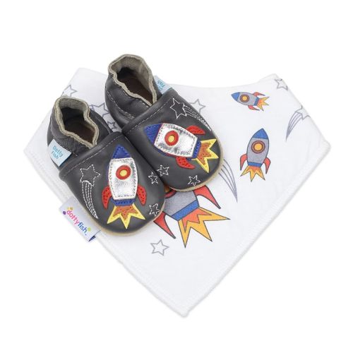 Charcoal Dotty Fish soft sole shoes with silver space rocket design, with a matching white bib with space rocket pattern.