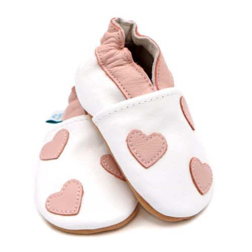 Dotty Fish white leather soft sole infant girl’s barefoot shoes with pink ankle trim and pink hearts.