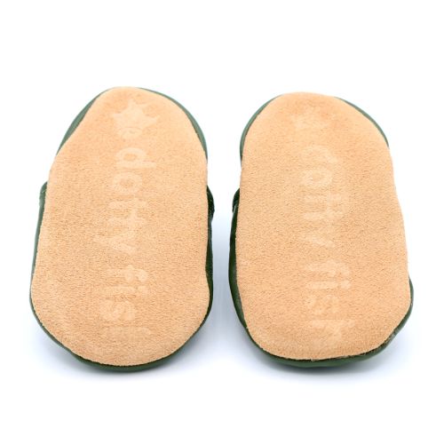 Non-slip soft suede soles of Dotty Fish pre-walker shoes imprinted with Dotty Fish name and logo.