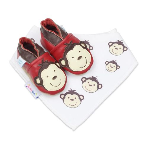 Red Dotty Fish soft sole shoes with brown ankle trim and monkey design, with a matching white bib with monkey design.