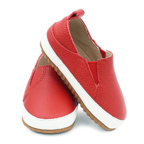 Unisex first walker slip-on shoes in red leather with rubber sole.