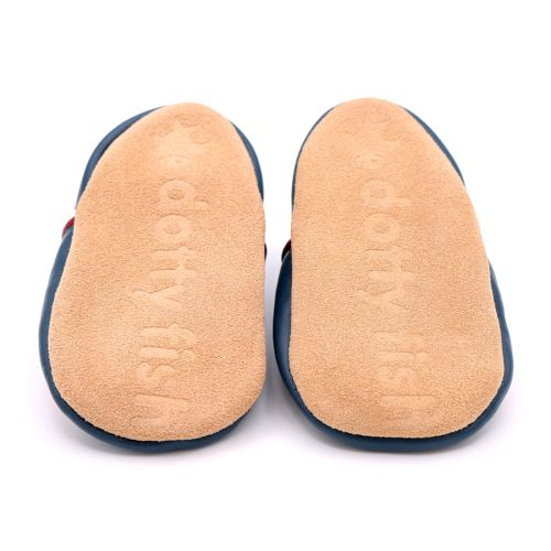 Non-slip soft suede soles of Dotty Fish pre-walker shoes imprinted with Dotty Fish name and logo.