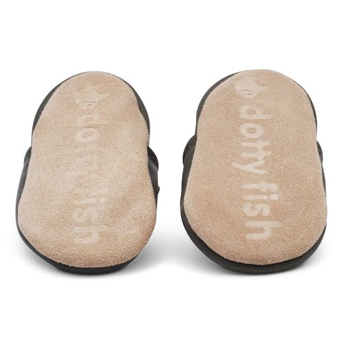 Non-slip soft suede soles of Dotty Fish pre-walker shoes imprinted with Dotty Fish name and logo