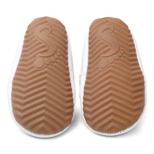 Rubber non-slip sole of Dotty Fish first walker shoes.