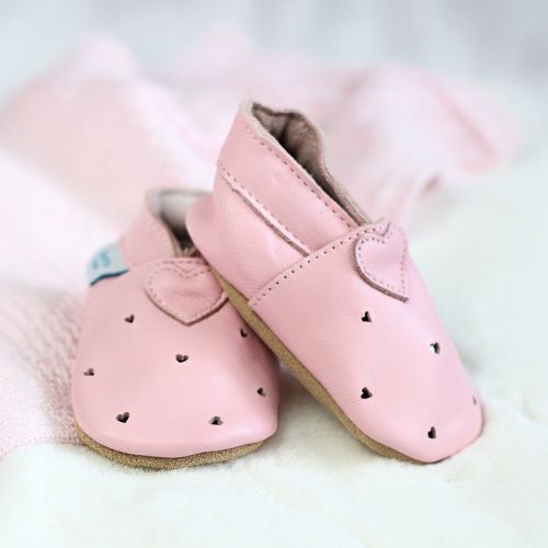 Pink cut-out hearts baby shoes.