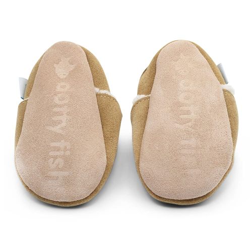 Soft suede non-slip sole of Dotty Fish infant slippers imprinted with Dotty Fish name and logo.