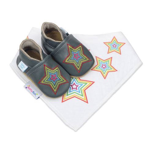 Dark grey Dotty Fish soft sole shoes with embroidered rainbow star design, with a matching white bib with rainbow star pattern.