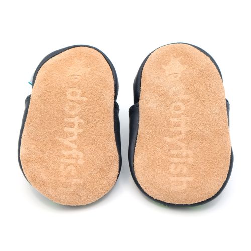 Non-slip soft suede soles of Dotty Fish pre-walker shoes imprinted with Dotty Fish name and logo.
