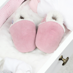Pale pink suede slippers with fleece lining, in drawer.
