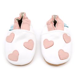 White leather Dotty Fish soft sole baby and toddler first walker shoes for girls with pink ankle trim and pink hearts.