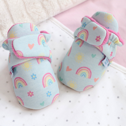 Pale blue cotton baby booties, with blanket.