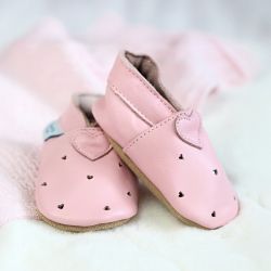 Pink cut-out hearts baby shoes.
